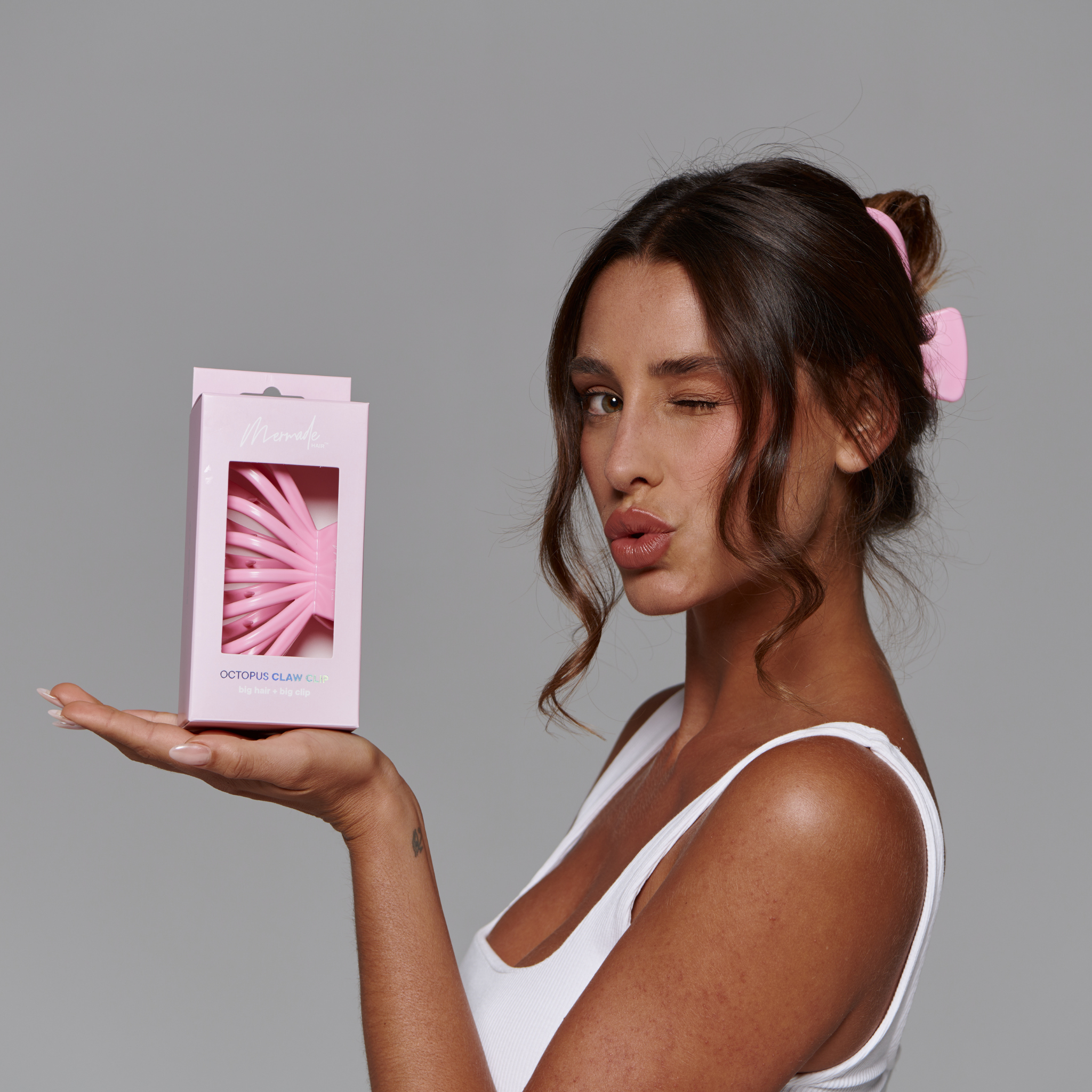 Model using the Mermade Hair Octopus Clip in pink