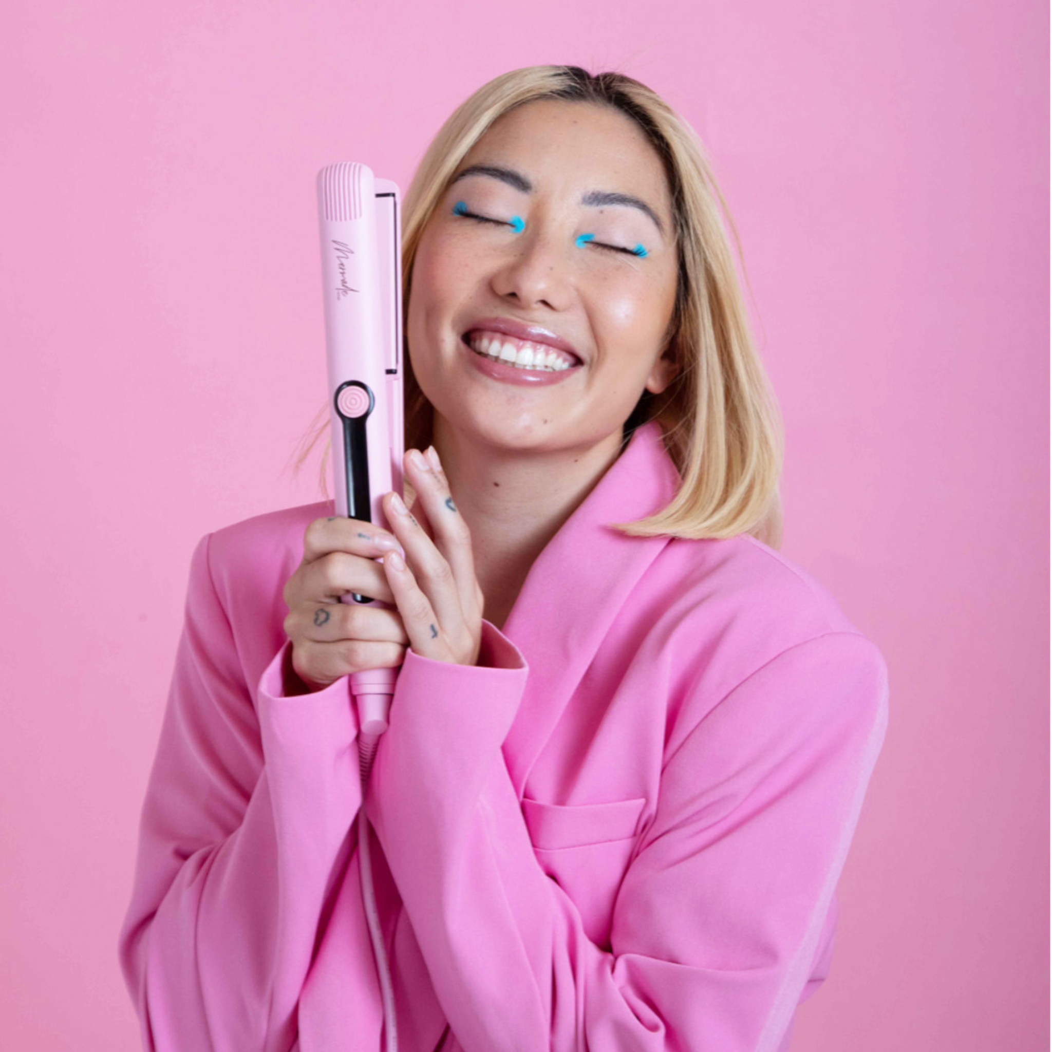 Model using the Mermade Hair Straightener - 28mm
