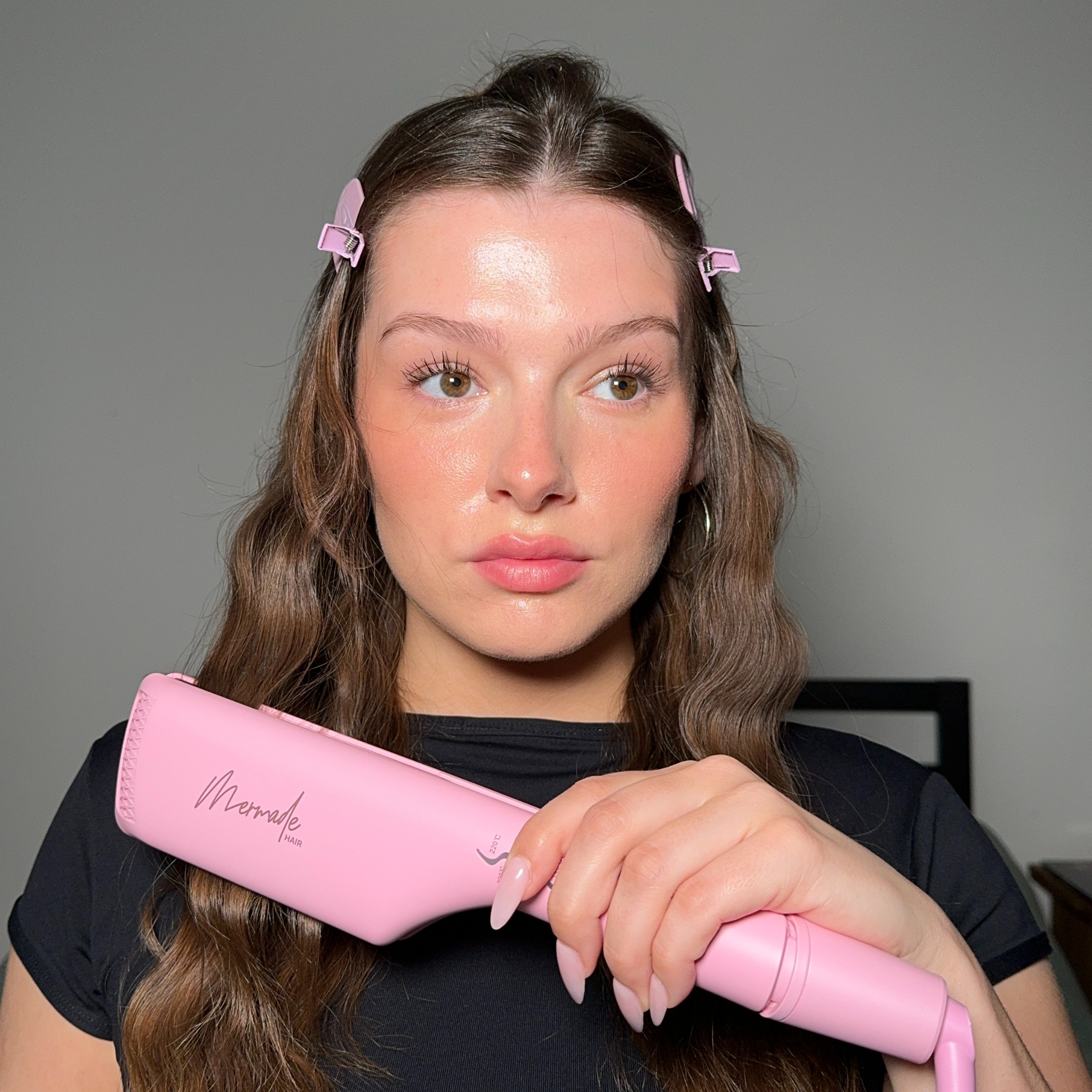 Model using the Mermade Hair Double Waver - Pink