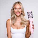 Blow Dry Brush - Signature Pink being shown and used by a model